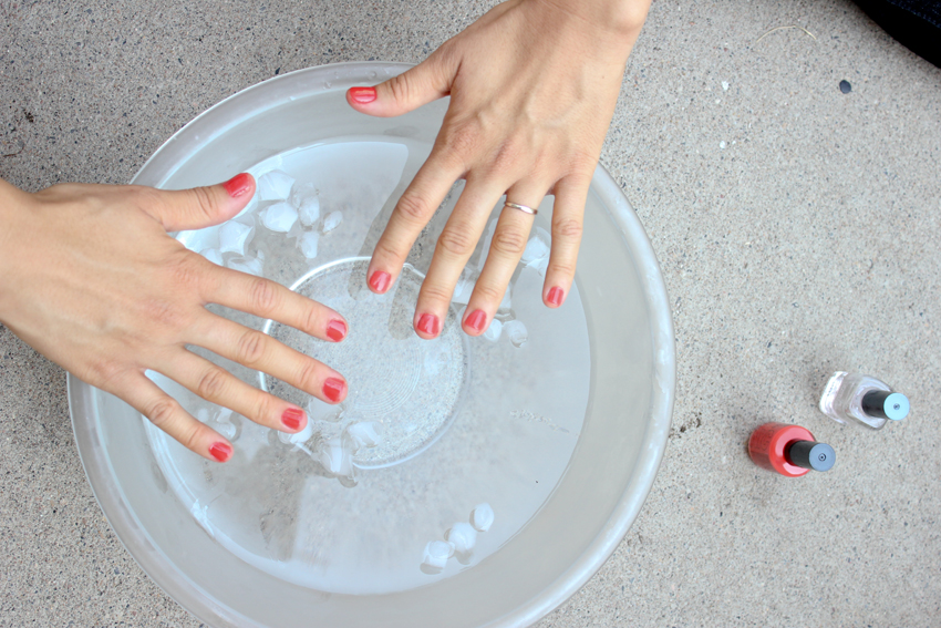 How do you dry nail polish fast?