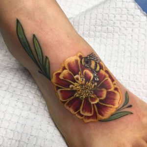 Marigold Tattoo Symbolism Meanings  More